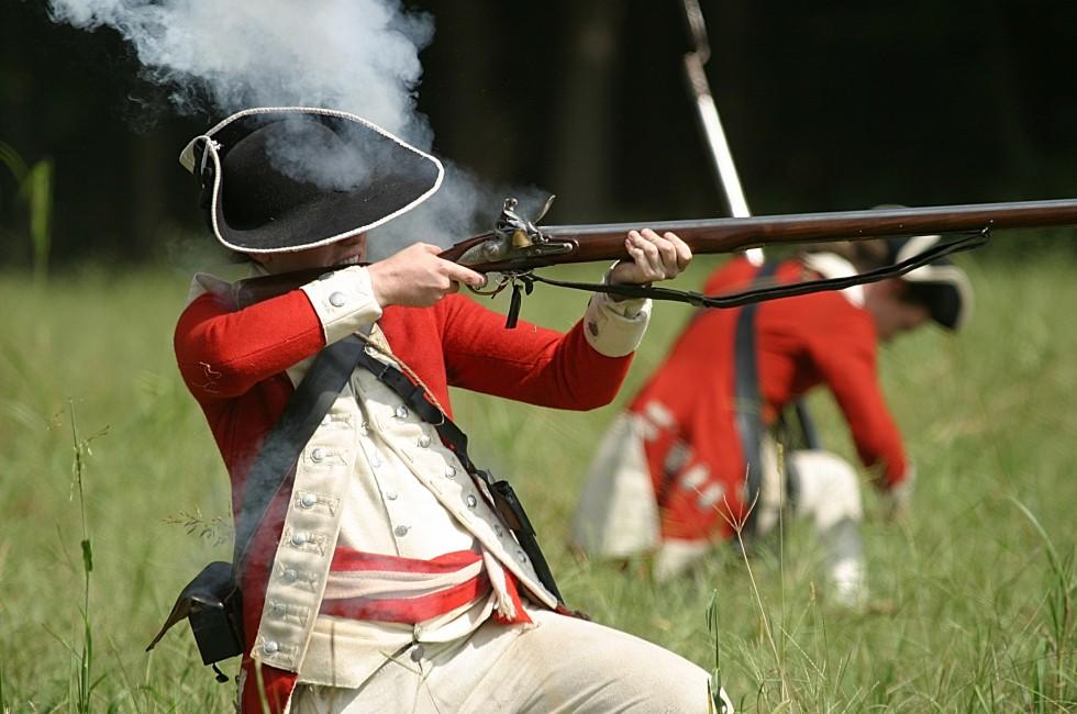 English Redcoat Soldier Firing Weapon.