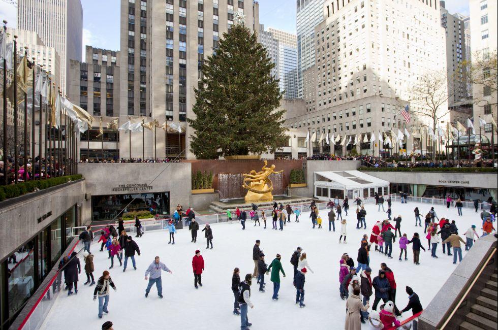 NEW YORK CITY - December 17: People enjoying Rockefeller Center Ice Skating at Christmas with the famous Christmas tree on December 17th, 2011 in New York City, New York.; Shutterstock ID 94127374; Project/Title: Fodors.com Slideshow; Destination: New York