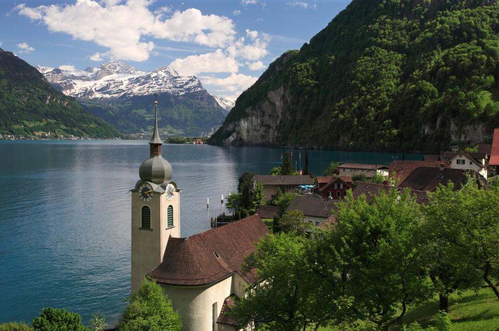 Looking over the church in Bauen onto Lake Lucerne in Switzerland.; 