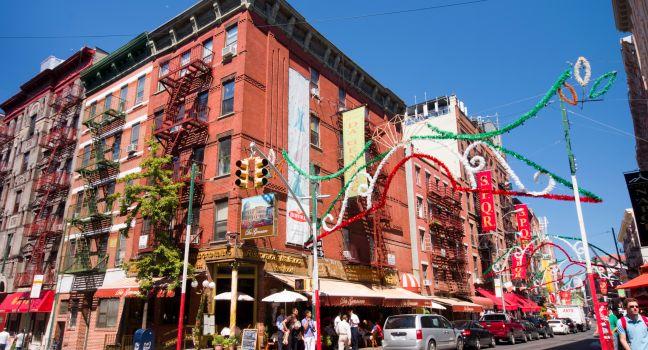 NEW YORK CITY - AUG 30: Intersection in historic Little Italy in lower Manhattan on Aug. 30, 2012. This landmark Italian neighborhood is known for its restaurants and annual Feast of San Genarro.