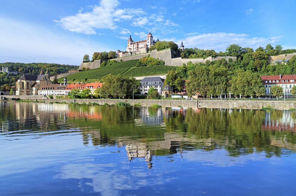 View of the Marienberg Fortress reflecting in the Main River in Wurzburg, Germany