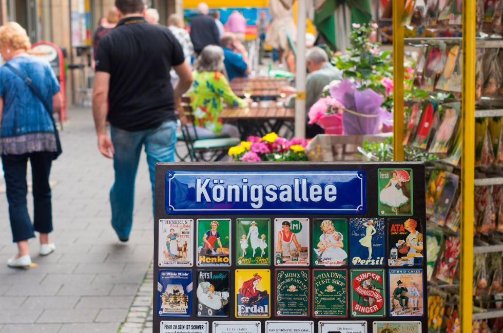 Konigsallee street name sign in dusseldorf, germany. It's famous for the fashion showrooms and luxury retail stores located along its sides. 