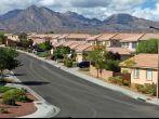 Desert homes, mountains and winter storm skies in the Western United States